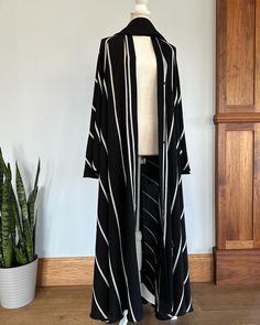 Have you found your next go-to abaya? Check out our shop for your next staple piece. https://elsakinacompany.etsy.com/listing/1733412406 Black Long Abaya For Spring, Long Black Abaya For Spring, Long Black Spring Abaya, Spring Black Long Abaya, Striped Abaya, Modest Abaya, Dubai Abaya, Head Coverings, Head Covering