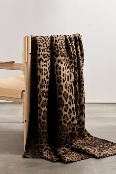 Dolce & Gabbana's blanket is made from soft wool and silk-blend and printed with the label's signature leopard spots. Drape it over your couch or chair to enliven your living space instantly. Leopard Print Throw Blanket, Silk Quilt, Winter Work Wear, Plaid And Leopard, Leopard Spots, Winter Cardigan, Luxury Blanket, Print Blanket, Fall Shopping