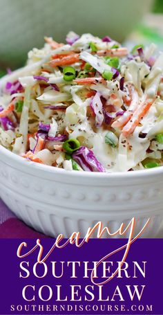 a white bowl filled with coleslaw slaw on top of a purple table cloth