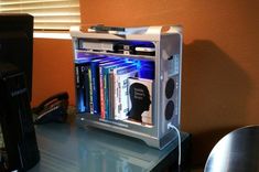 a small white computer case sitting on top of a table