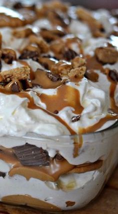 a dessert dish with chocolate, marshmallows and caramel drizzle