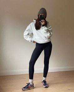 27 Easy Outfit Ideas I'm Wearing on Rotation Right Now | Who What Wear UK Leggings With Socks, Socks Over Leggings Outfit, High Socks Outfits, Stylish Workout Clothes, Easy Outfit Ideas, 23 Fashion, Dresses With Cowboy Boots, Winter Capsule