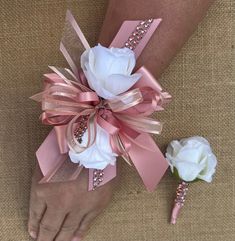 the bride's bouquet is tied to her wrist