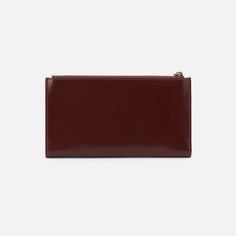 This slim bifold wallet has a simple design with thoughtful interior organization. Jill Large Bifold Wallet In Polished Leather  Chocolate LARGE WALLET in Chocolate | Hobo® Bifold Clutch With Interior Card Slots For Daily Use, Modern Bifold Clutch With Card Slots, Modern Bifold Clutch For Business, Modern Business Bifold Clutch, Modern Bifold Business Clutch, Bifold Clutch With Coin Pocket, Versatile Leather Bifold Wallet, Elegant Trifold Wallet With Interior Card Slots, Elegant Trifold Card Holder For Everyday