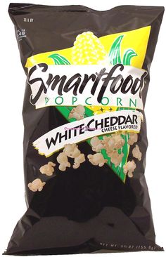 a bag of white cheddar popcorn on a white background