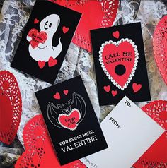 valentine's day cards are laid out on lace