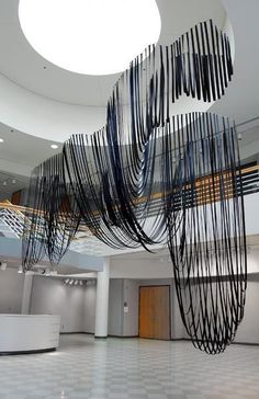 an artistic sculpture in the middle of a building