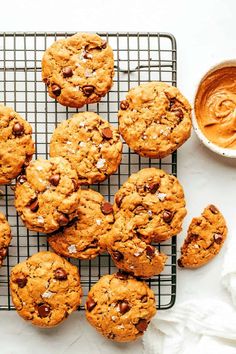 chocolate chip cookies on a cooling rack with peanut butter