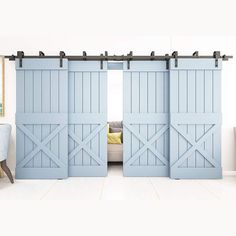 an open blue barn door in a living room with white walls and flooring on the side