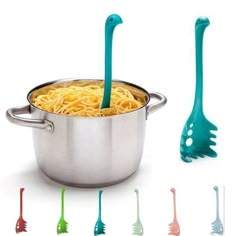 several colors of pasta in a pot with spoons and forks next to each other