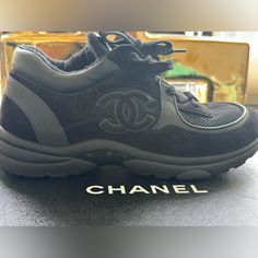 Used Women Chanel Trainers Suede Elegant Black Round Toe Sneakers, Black Leather Evening Sneakers, Evening Black Leather Sneakers, Chic Black Leather Sneakers, Black Sneakers For Streetwear, Stylish Black Sneakers For Streetwear, Elegant Black Evening Sneakers, Chanel Runners, Chanel Trainers