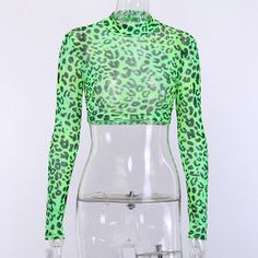 Material: Polyester Material: Spandex Clothing Length: Short Gender: Women Decoration: None Fabric Type: Broadcloth Pattern Type: Leopard Sleeve Length(cm): Full Model Number: 90406 Sleeve Style: REGULAR Collar: Mandarin Collar Style: Sexy & Club color: NeonGreen season: Autumn,Winter style: Fashion ,Streetwear,Casual Fabric: mesh Green Sheer Mesh Top, Sheer Green Mesh Top, Fitted Green Crop Top For Spring, Green Stretch Top For Club, Sheer Stretch Crop Top For Club, Green Long Sleeve Top For Club, Fitted Green Mesh Top, Spring Club Crop Top With Stretch, Green Sheer Mesh Top For Summer