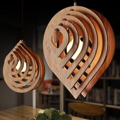 wooden lights hanging from the ceiling in a room