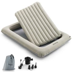 an inflatable air bed and accessories on a white background