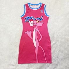 a pink cartoon character tank top with blue trim