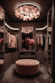 a walk in closet filled with lots of pink flowers