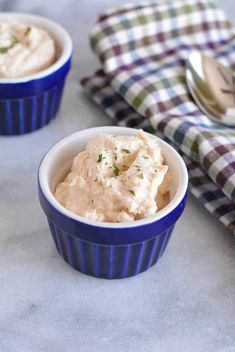 lemon and garlic pured salmon in small blue bowls