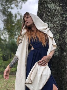 Looking for a mystical hood? The Medicine Magi Hood Scarf is made out of organic raw silk fibre and inspires a medieval magician look. It can be worn as a poncho or as a hood and fits perfectly to any Jedi, nomads, burning man wardrobe. Feeling inspired? PIN this and Follow us to be part of the tribe and find more wonderful organic garments on our website and feed. Medieval Magician, Man Wardrobe, Goddess Dresses, Bohemian Chic Outfits, Hood Scarf, Organic Fashion, Fairy Style