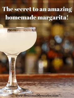 a margarita sitting on top of a wooden table