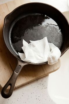 a frying pan with tissue paper in it