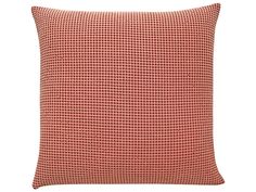 a red and white pillow on a white background