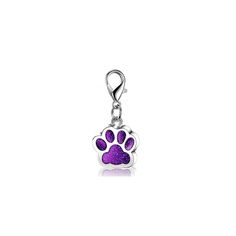 a purple dog paw charm on a white background