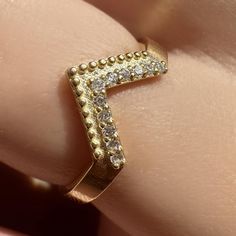 18K Gold Diamond Curved Ring, V Shaped Diamond Stacking Ring, Minimalist Promise Ring, Fine Jewelry, Moissanite Diamond Ring ★100% Satisfaction Guarantee ❤ ★Material: Solid Real Gold (not gold filled or gold plated) ★Gold Setting : 8K-333, 14K-585 or 18K-750 ★Number of Stones: 11 pieces - 1.10 mm   ★Diamond Carat : 0.07 ctw ★Tape Width : 2.20mm ★Natural Diamond Color and Clarity: F-SI 💎 ★ Diamond Color and Clarity F Color VS2 Clarity 💎 ★ Anti Allergic ★ Shipping with Product Certificate. ★ Free Express Shipping 🌎 ★Possibility of return within 2 weeks after delivery. Product Details💎 ■Made to Order. ■Gold: 14K Solid Gold ■Gemstone : Stones High Quality Cubic Star Zirconium ■Special gold color: Gold, Rose Gold, White Gold ❤We are delighted to offer products that complement your daily ele Curve Ring, Diamond Stacking Rings, Moissanite Diamond Rings, Special Jewelry, Moissanite Diamonds, Jewelry Pouch, Stacking Rings, V Shape, Jewelry Gift Box