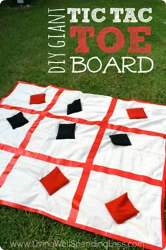 a red and white checkered quilt on the grass with text overlay that reads diy tic tac toe board