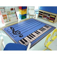 a child's rug with musical notes on it in the middle of a room