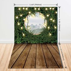 an image of a mirror surrounded by greenery with lights on the wall and wood floor