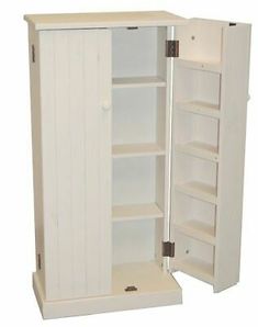 an open white cabinet with shelves on both sides and one door opened to the other side