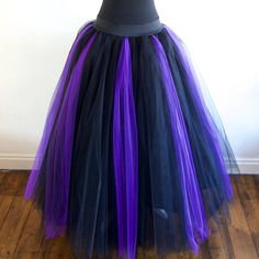 a black and purple tulle skirt on a mannequin