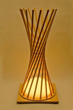 a lamp that is made out of wood sticks