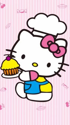 a hello kitty holding a cupcake in her hand