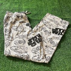 Star Wars Doodle Ships Elastic Waist Jersey Lounge Sleep Pajama Pants Size S Nighttime necessities. Enjoy the superior comfort of this men's cotton sleep pants from Star Wars. #StarWarsFashion #DoodleShipsPajamas #ElasticWaistPants #JerseyLounge #SleepwearStyle #SizeSComfort #GeekChic #PajamaParty #NighttimeVibes #StarWarsFans Star Wars Pjs, Matching Pajamas For Couples, Pajamas For Couples, Star Wars Pajamas, Star Wars Fashion, Sleep Pants, Pajama Party, Elastic Waist Pants, Geek Chic