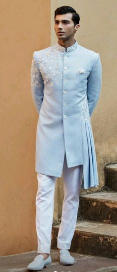 Details : Color - sky blue  Any Color you may ask for...(We can make it)  Fabric important Fabric  Work Details ;Embroidery Bottom Details -white- Pajama Package Include : Top , Bottom,, All others accessories are for photography purpose only . Just the Top and bottom available . Color variation may be there slightly , due to computer resolution and camera . Sky Blue Sherwani For Groom, Luxury Silk Sherwani, Luxury Off-white Bandhgala For Eid, Sherwani Latest Design, Luxury Art Silk Sherwani With Gota Work, Luxury Embellished Sherwani For Men, Mehndi Clothes For Men, Men Bridal Wear Indian, Sky Blue Sherwani For Men