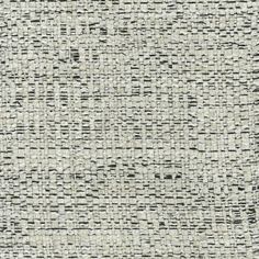 an upholstered fabric textured with black and white lines on a gray background