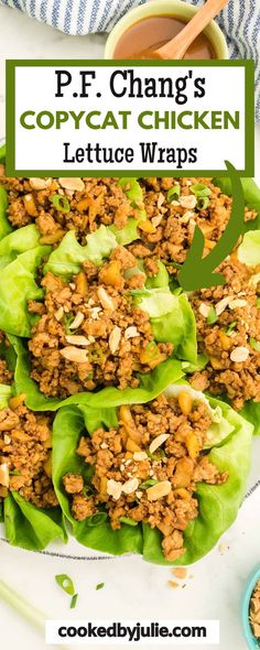 lettuce wraps filled with meat and topped with nuts