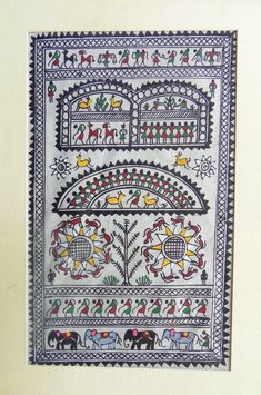 an intricately designed wall hanging with elephants and horses on it's border, in white frame