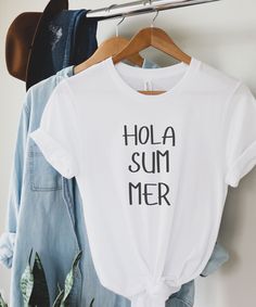 -Hola Summer!  -Perfect vacation tee to welcome summer this year    - This Bella Canvas unisex classic tee is made from 100 soft-spun cotton - Rolled sleeves are for styling purposes only - My shirts are made to order specially for you. Because of this reason returns or exchanges are not accepted. Please check the color and size charts before you place your order. If you have any questions please send a message to clarify sizing or colors! - Machine wash cold and tumble dry low, no bleach or dry Spanish Teacher Gifts, Welcome Summer, Spanish Teacher, Family Tees, Heather Green, Rolled Sleeves, Size Charts, Teacher Shirts, Summer Shorts