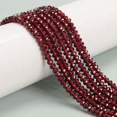 Check out our Coupon Codes Below! Material: Natural Red Garnet (Not Treated or Dyed) Shape:  Faceted Rondelle Color: Dark Red  Size:  2.5x4mm - Approx 140 Beads Per Strand Hole Size: Approx 1mm Mined in Brazil Note:  -Gemstone bead sizes are approximate and may have a +/- 0.5mm difference.   -Gemstone bead drill hole sizes are approximate and may have a +/- 0.2mm difference. Use our Coupon Codes for Big Savings! 10% off when you spend $50LRC10 15% off when you spend $100LRC15 20% off when you sp Red Rondelle Jewelry With Faceted Beads, Red Multi-strand Dangling Beads, Red Multi-strand Jewelry With Polished Beads, Red Large Multi-strand Beads, Red Multi-strand Gemstone Beads, Bead Sizes, Gem Show, Jewelry Making Project, Sewing Stores