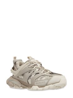 Mesh and faux leather upper. Lace-up closure. Front and back pull loops. Logo details. Rubber sole Balenciaga Shoes Mens, Balenciaga Track Sneakers, Track Sneakers, Balenciaga Men, Balenciaga Women, Balenciaga Sneakers, Balenciaga Track, Balenciaga Shoes, Sneakers Grey