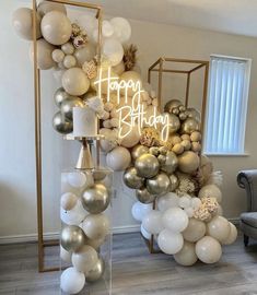 a birthday party with balloons and lights