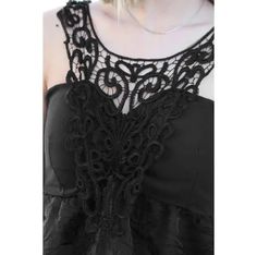 This stylish tank top features intricate eyelet lace detailing, a padded bra, and a v-style neckline with an elastic back. Fresh from the manufacturer, these items are being sold for the first time without tags. Crafted from polyester, it's a perfect choice for any occasion. Sleeveless Lace Top With Lace Closure, Fitted Sleeveless Lace Top With Lace Closure, Fitted Sleeveless Tank Top With Contrast Lace, Summer Lace Closure Top For Night Out, Summer Tops With Lace Closure For Night Out, Summer Night Out Tops With Lace Closure, Sleeveless Lace Top With Lace Closure For Summer, Contrast Lace Sleeveless Party Top, Party Sleeveless Top With Contrast Lace