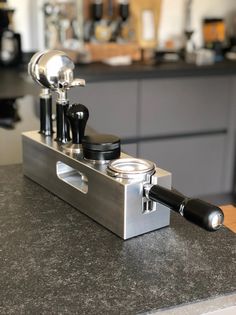 an espresso machine sitting on top of a counter