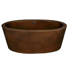 a large brown bowl sitting on top of a white wall