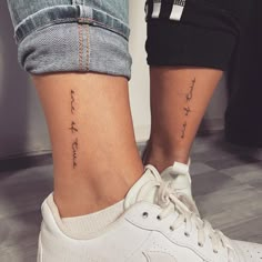 a woman's foot with a small tattoo on her left ankle and the word faith written in cursive writing