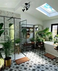 a bathroom with tiled flooring and plants in the bathtub, windows, and potted plants