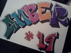 some type of graffiti written in different colors and sizes on a piece of white paper