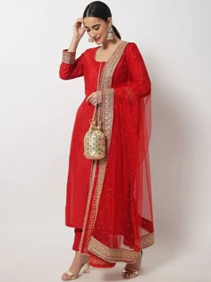 This is a beautiful 3 piece suit set. It comes with thread embellished straight cut kurta has 3/4th sleeves, round neck, calf length teamed with solid trouser pants and a net dupatta with zari & stones detailing. 3 piece set Color- Red Work- Beads & Zari Embellished Detailing Kurti Length - 46 inch Kurta Fabric-Silk Bottom Fabric - Silk Dupatta Fabric-Net with Zari & Stones Detailing Sleeves-3/4th Sleeves Neck-Round Neck Care - Dry Clean Note - The set does not include potli bag Luxury Bollywood Silk Unstitched Suit, Luxury Silk Bollywood Unstitched Suit, Luxury Traditional Anarkali Set With Straight Kurta, Luxury Red Straight Kurta Traditional Wear, Luxury Red Kurta With Zari Work, Luxury Red Churidar For Eid, Luxury Katan Silk Unstitched Suit With Zari Work, Luxury Red Salwar Kameez For Diwali, Luxury Dola Silk Unstitched Suit With Zari Work